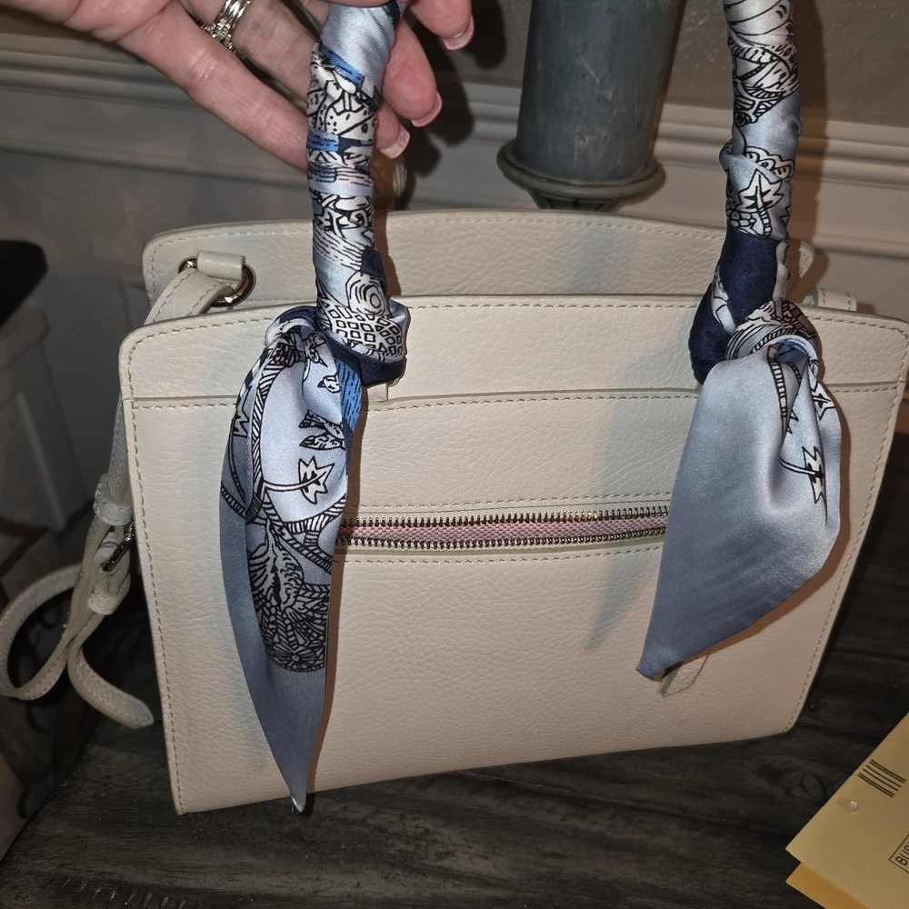Dooney and Bourke Elegant Cream White Leather Satchel Wallet.